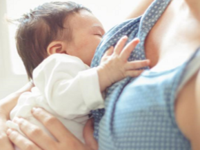 Mother breastfeeding infant Mother breastfeeding infant
