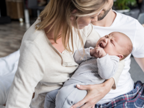 mother holding crying baby mother holding crying baby