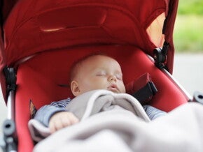 Baby sleeping in a pram