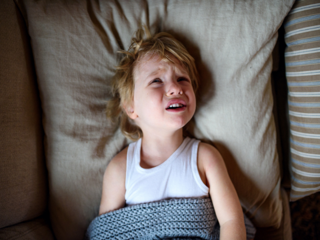 upset child in bed